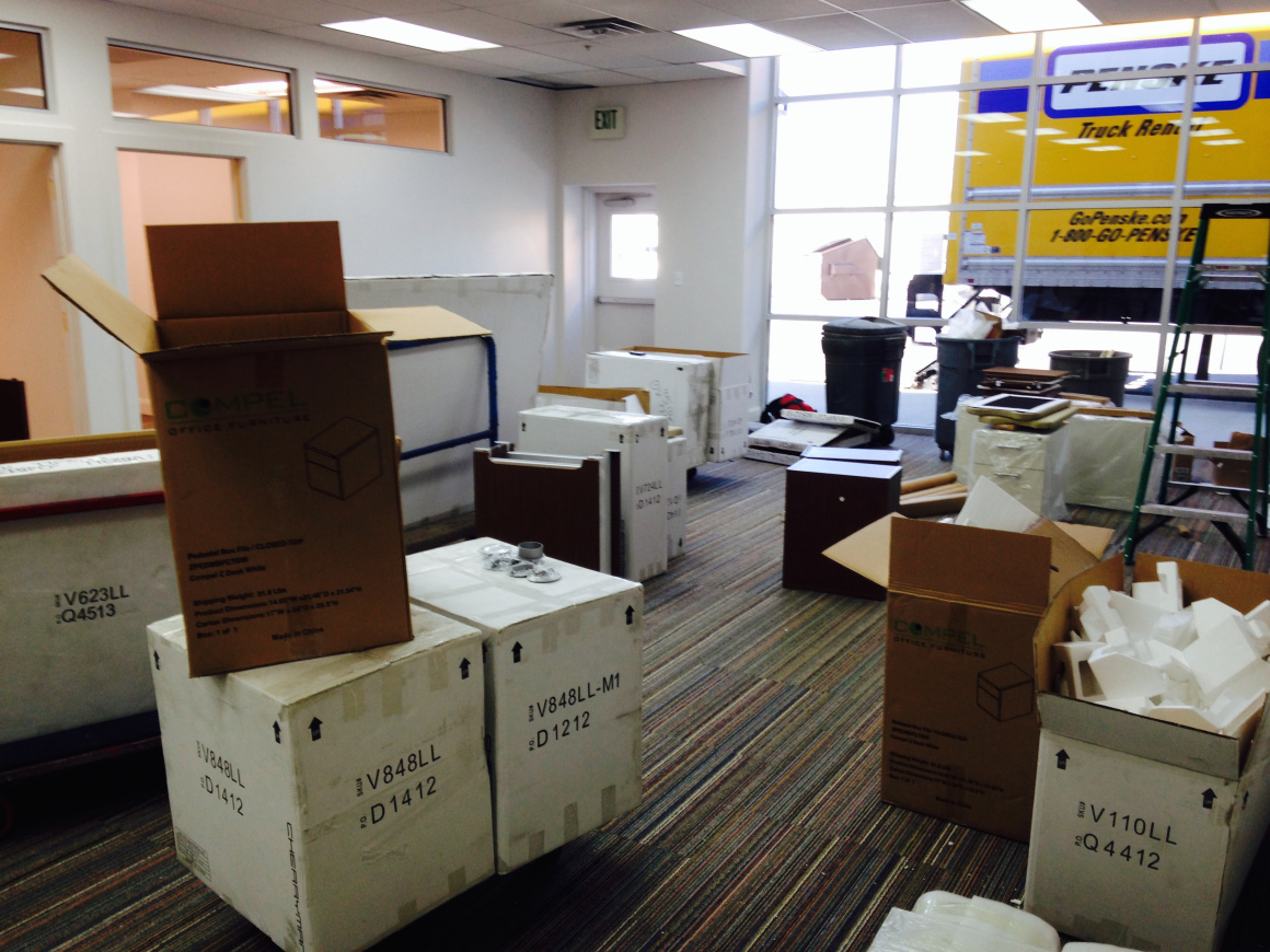 New furniture arrives at StealthCo offices.